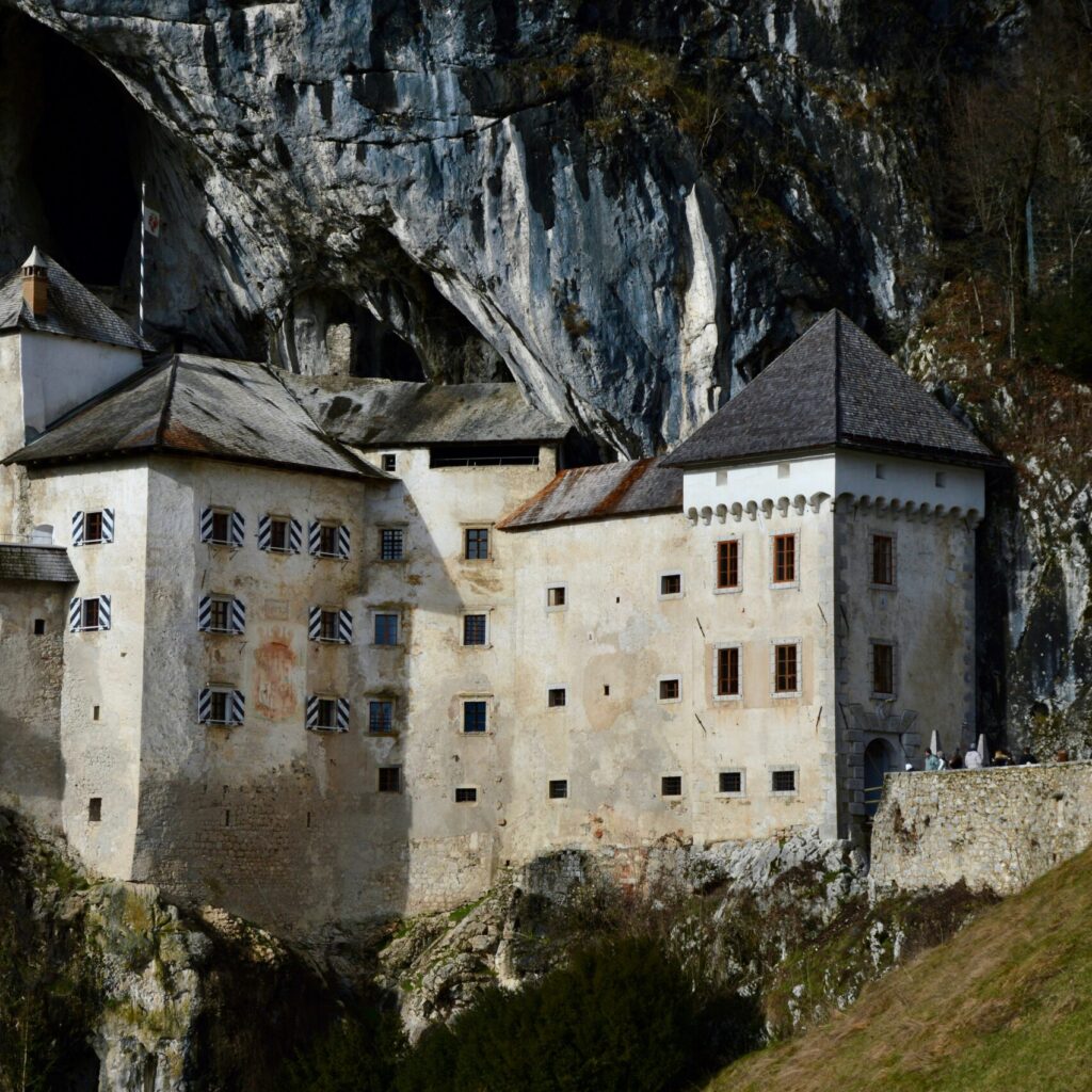 Slovenian Castle peached on cliffside